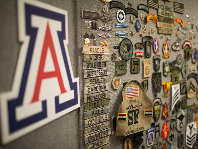 A wall with an "A" logo and also military-related pins, medals, badges and patched